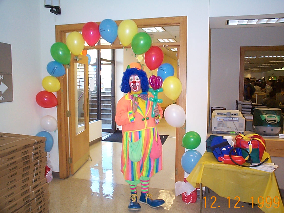 Gogo makes balloon art at the Micro Center 20th Anniversary sale